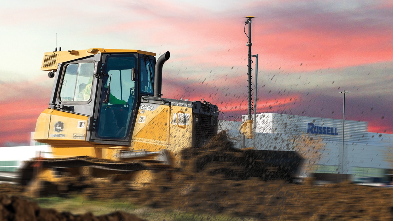 A 650K LGP Crawler Dozer shapes the land on a Russell jobsite.